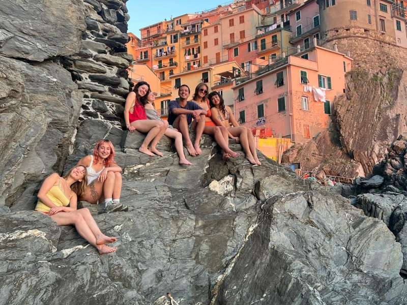 Students on Rocky Cliffside