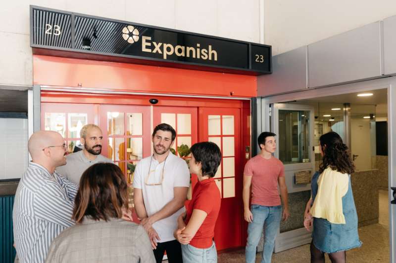 students outside expanish building