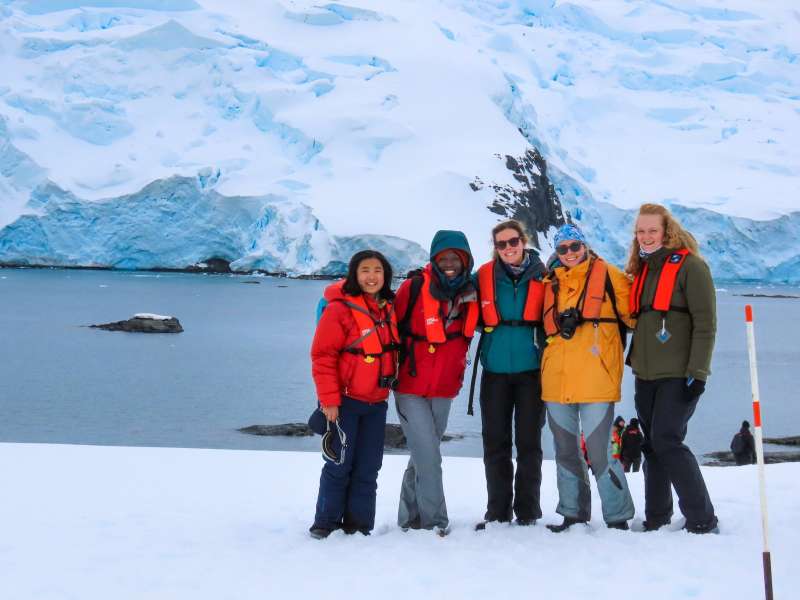 Students pose on glacier