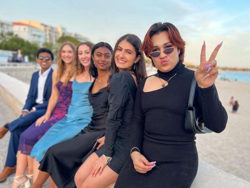 students posing at beach in Nice
