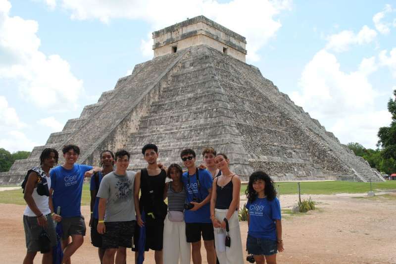Students posing by pyramid in the yucatan