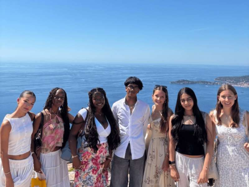 Students posing by the sea in France