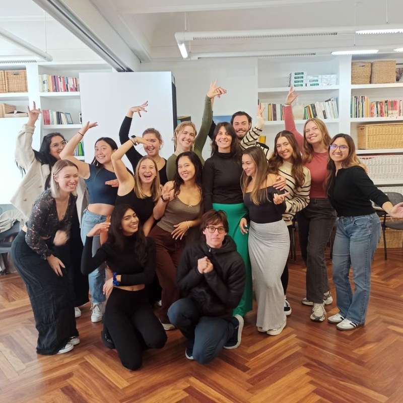 Students posing in class in Madrid