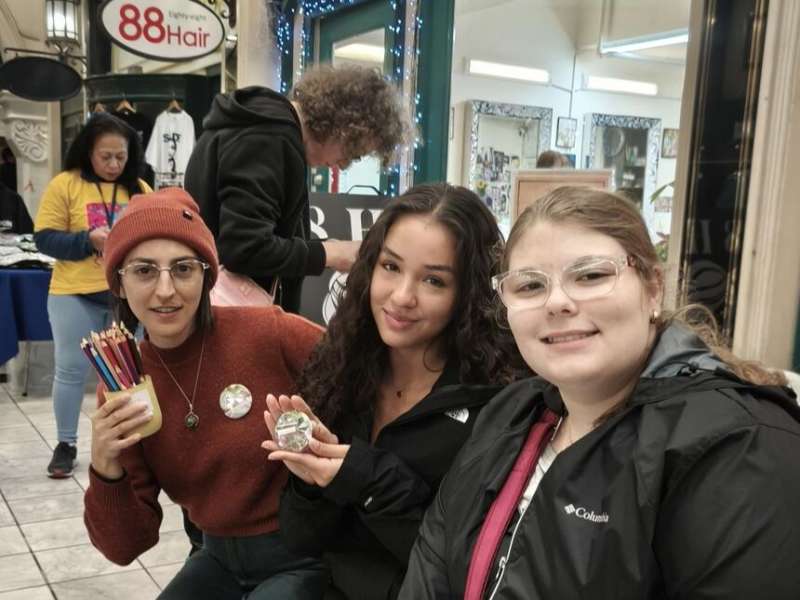 Students posing in store in Auckland