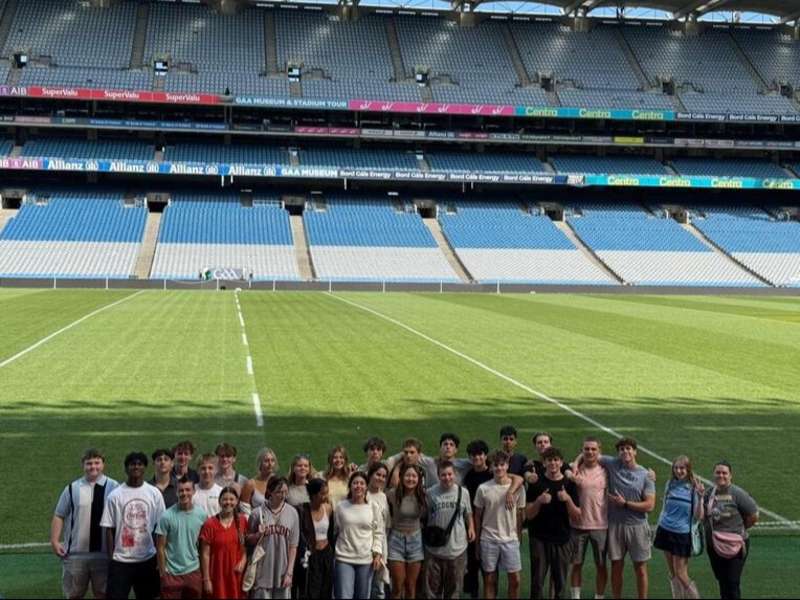 Students posing on field at Croke Stadium in Dublin