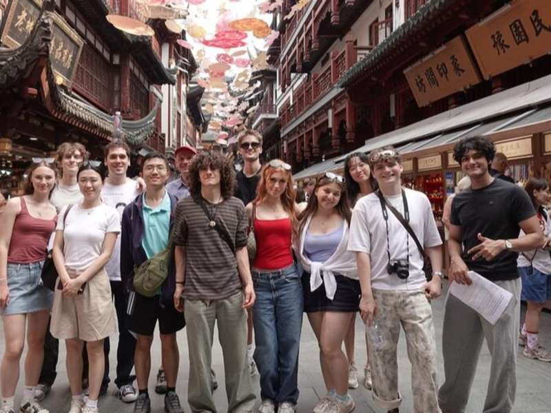 Students posing on street in Shanghai