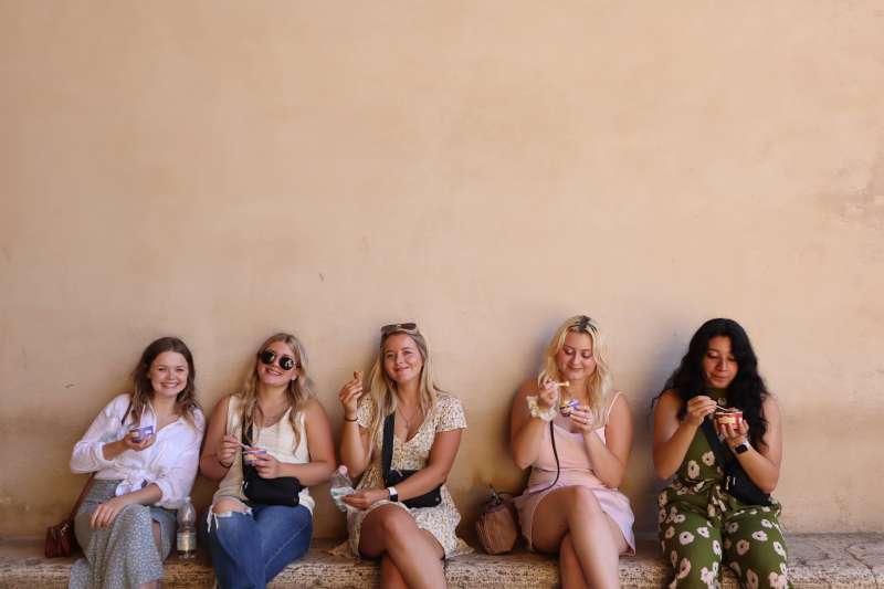 Students relaxing during excursion