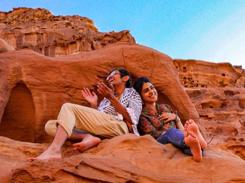 Students sitting on mountain in Jordan