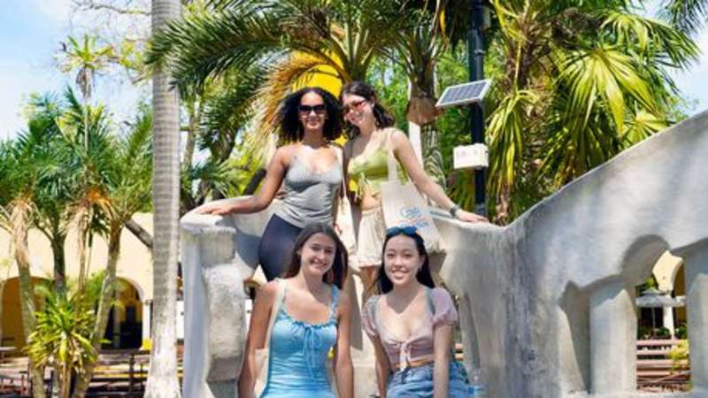 Students smiling in park in Mexico