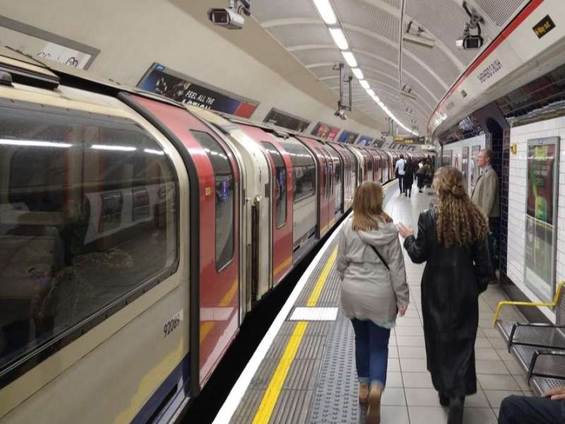 Students walk along the platform at Shepherd’s Bush Underground station in London.