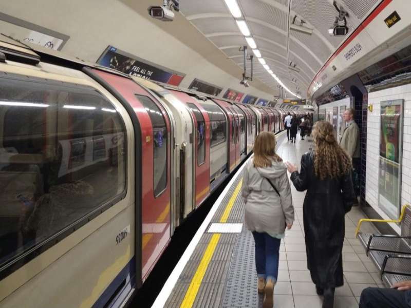 Students walk along the platform at Shepherd’s Bush Underground station in London.