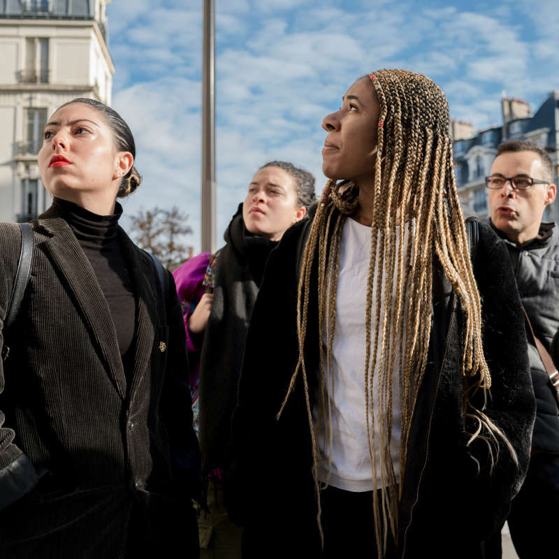 Students walk around Paris.