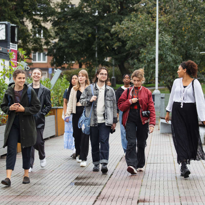 Students walk outside in Prague.