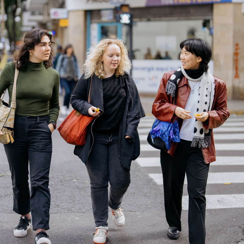 Students walking in the city. 