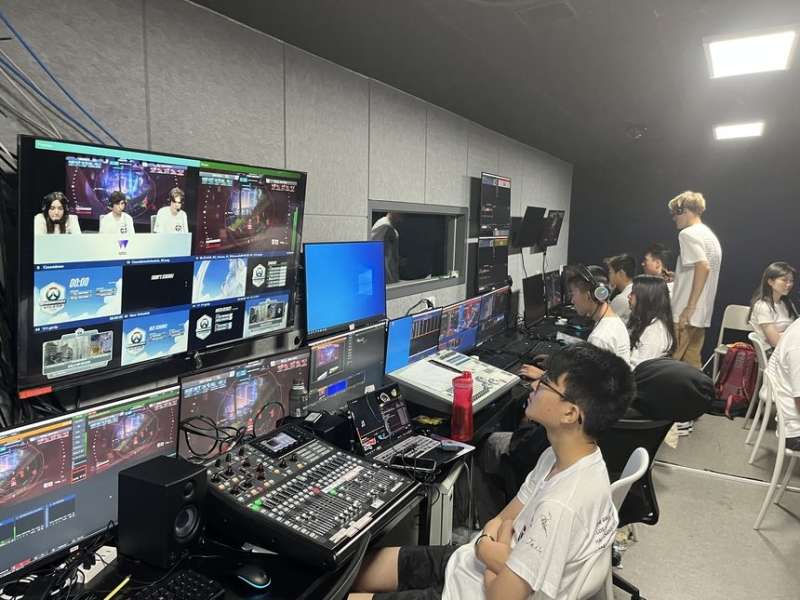 Students watching esports on program in Kyoto