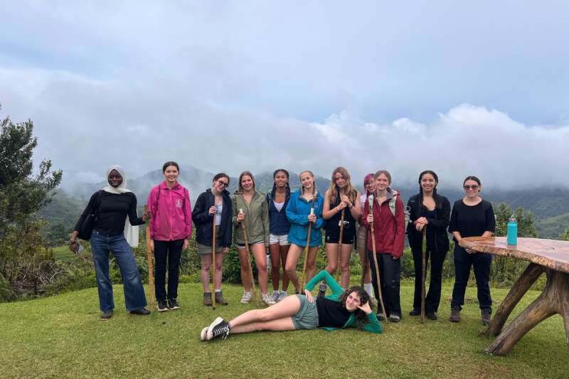 Students with walking sticks on a hike in Monteverde