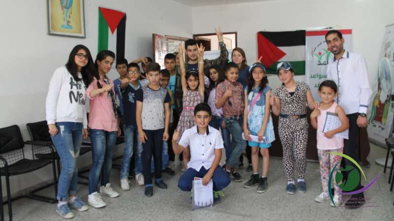 Teaching English to Palestinian children at a community center in Dura Hebron