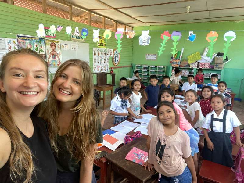 Teaching Interns with school children in Peru