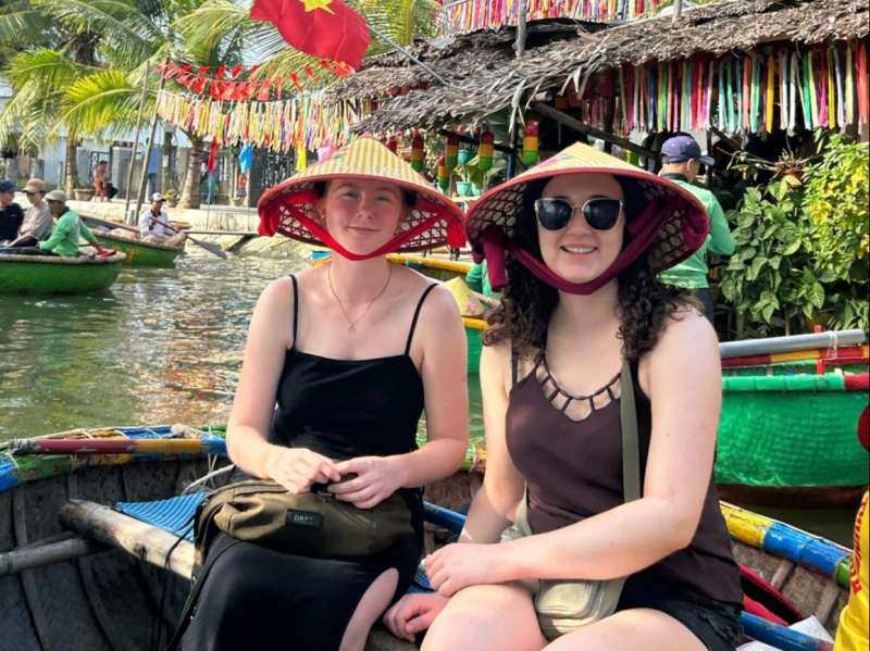 TEFL teachers exploring Hoi An's famous basket boats during a weekend trip in Vietnam.