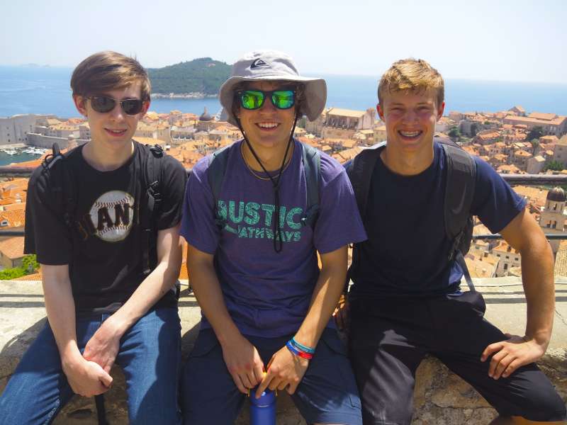 Three boys on the wall in Dubrovnik 