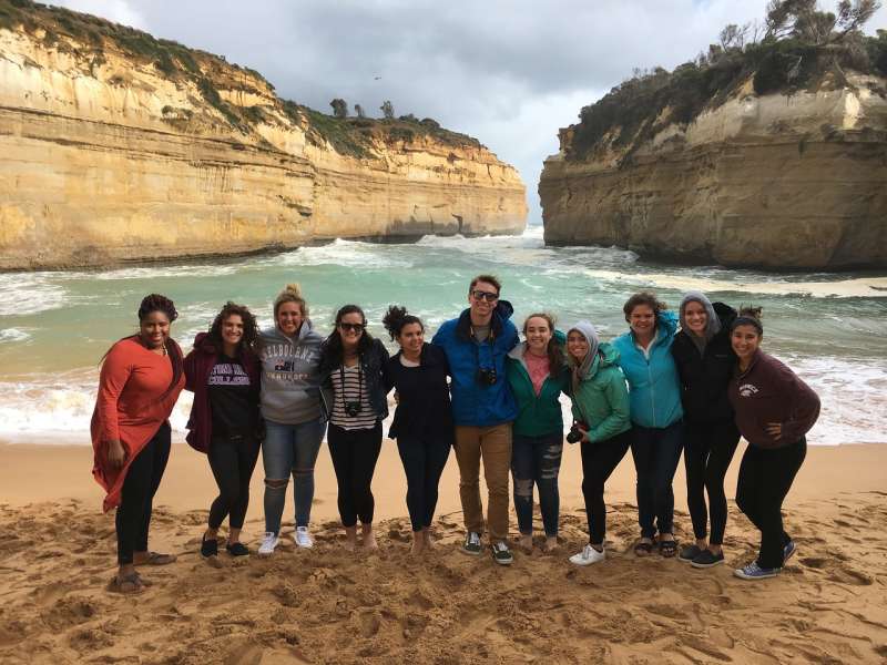 Tourists posing at Loch Ard Gorge.