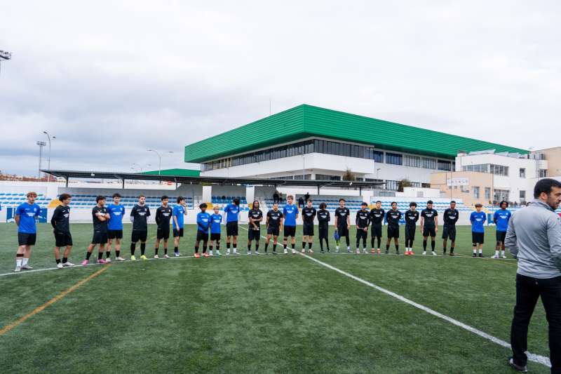 two soccer teams lined up
