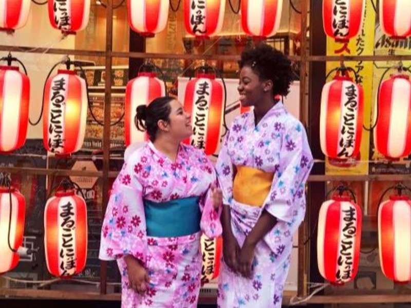 Two students wearing kimonos.