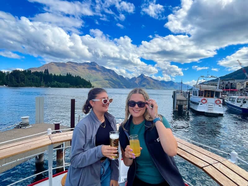 Two women on a boat in Queenstown, New Zealand