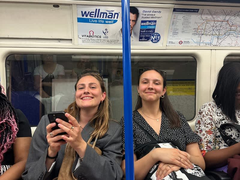 Two women on the London underground tube