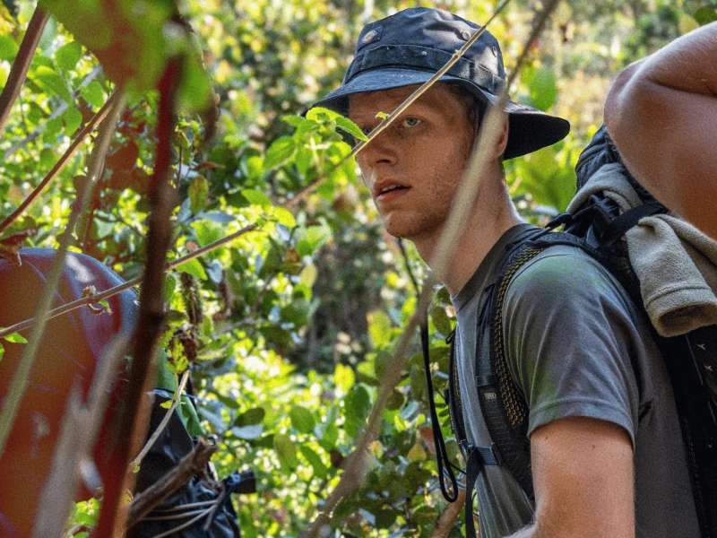 Venturer in forest
