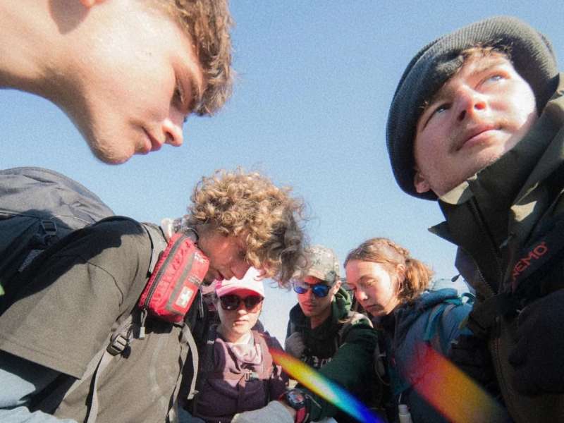Venturers read map