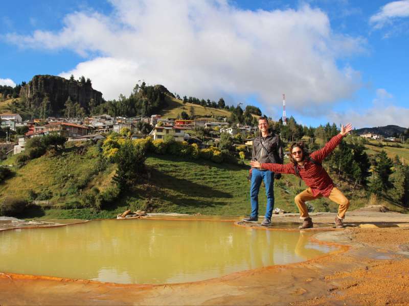 volunteer-jumping-reservoir-andean-hills-guaranda