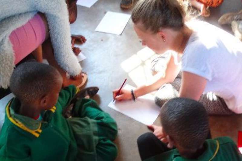 volunteer teaching in a day care centre