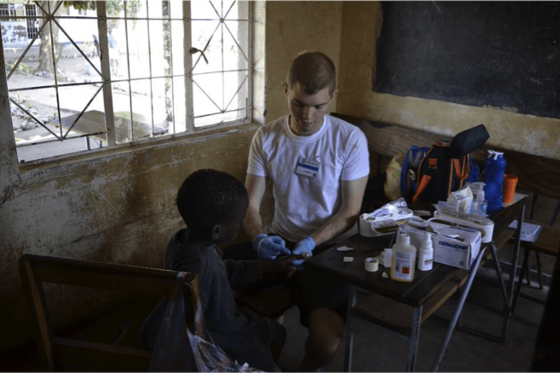 Intern treating the child