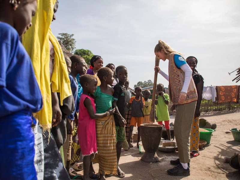 volunteer visiting the community