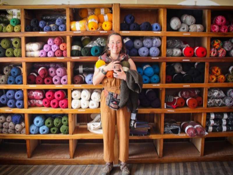 volunteer-wool-yarn-shelves-artisan-workshop