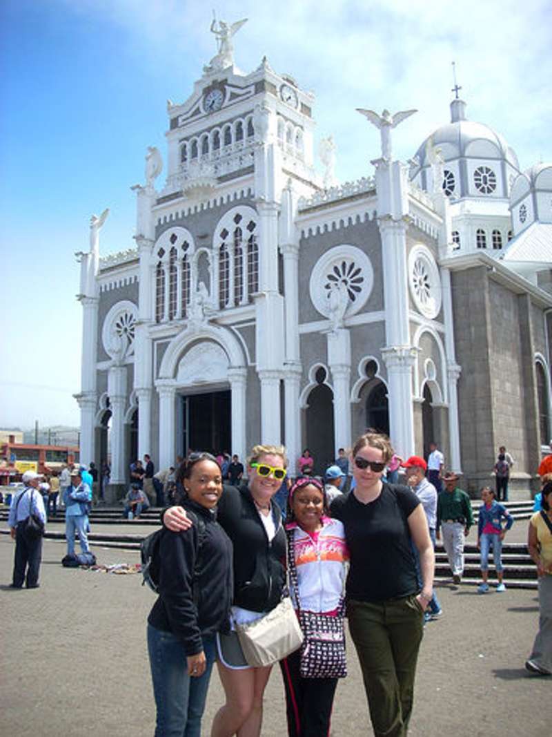 Volunteers in front of the church