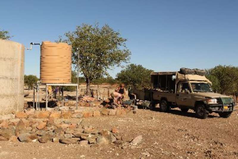 volunteers next to truck