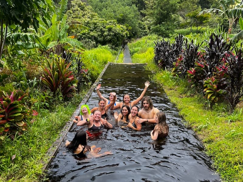 Volunteers swimming in Hawaii after local volunteer project